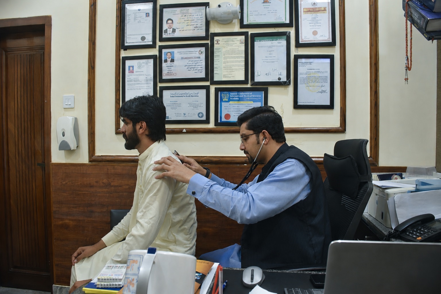 Doctor examining patient