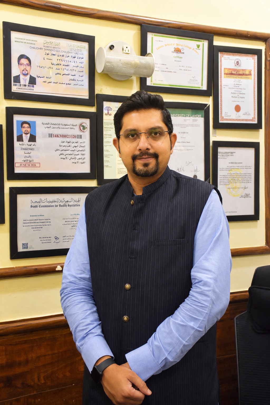 Doctor portrait with certificates